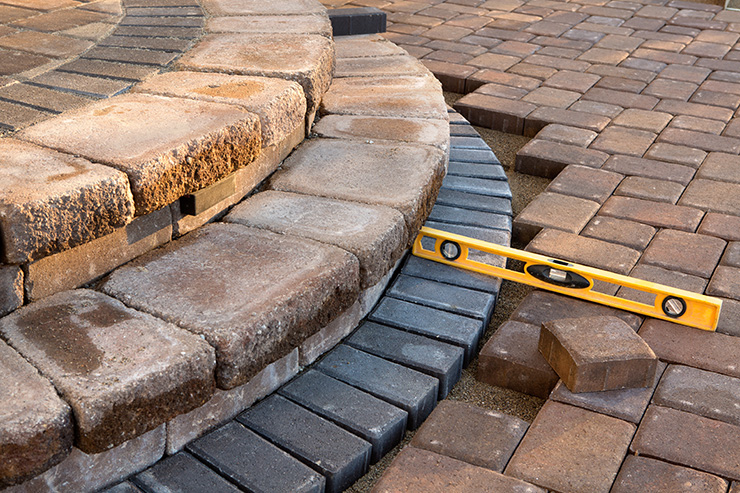 Picture of a patio being built and measured