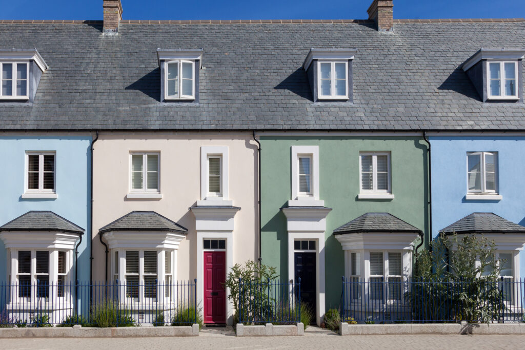 Picture of a row of houses with colourful paint